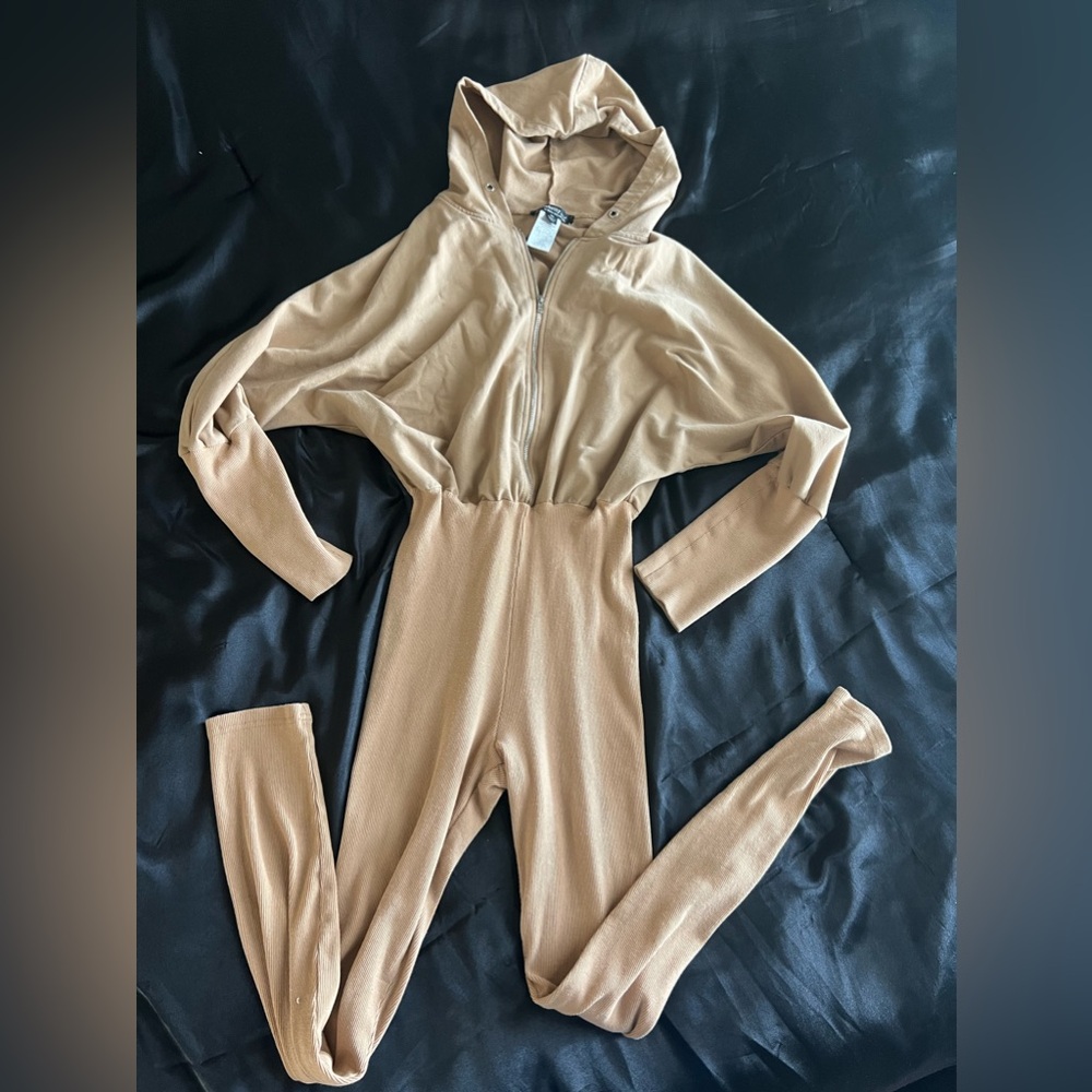 Tan jumpsuit with hood